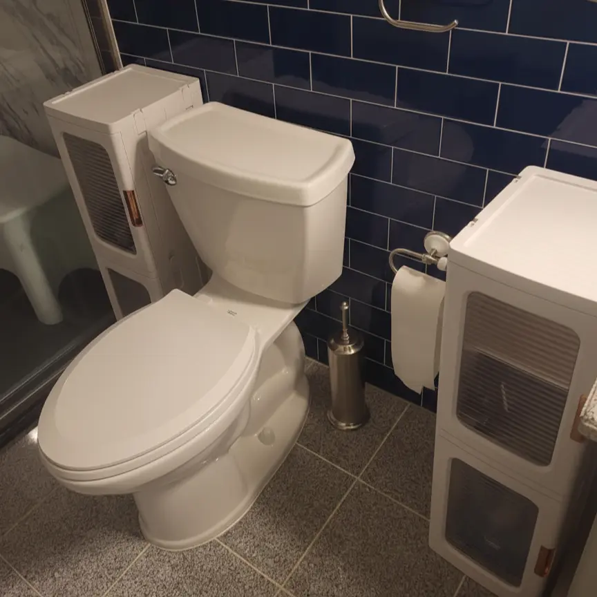 tall-narrow-storage-cabinet-anti-tip-design-360-swivel-wheels-stability-features